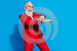 Profile side photo of senior excited man happy positive smile dance hip-hop club isolated over blue color background