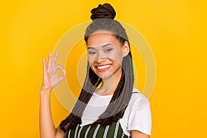 Profile side photo of young afro girl happy positive smile show okay alright sign deal done isolated over yellow color