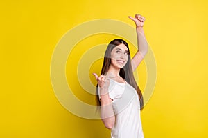 Profile side photo of young girl happy positive smile point thumbs empty space suggest sale advertise isolated over