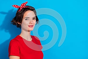 Profile side photo of young pretty woman good mood promoter advertising isolated over blue color background