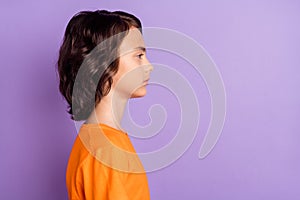 Profile side view portrait of attractive content serious boy copy space isolated over violet purple color background