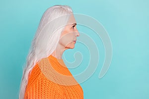 Profile side view portrait of attractive content serious grey-haired woman copy empty space isolated over teal bright
