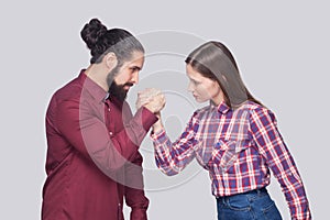 Profile side view portrait of bearded man and woman in casual st