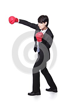 Profile of successful businessman punching