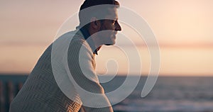 Profile, sunset and thinking man by beach on vacation or holiday mockup space. Ocean, side view and happy male person