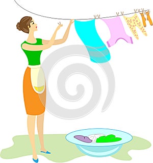 Profile of a sweet lady. The girl washed her clothes and hung them on the rope to dry. A woman is neat and a good housewife.