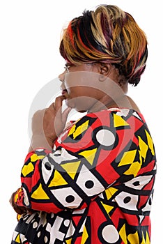 Profile view of fat black African woman thinking