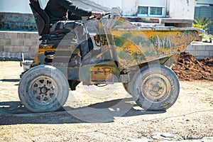 Driving the dumper through the garden photo