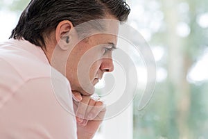 Profile View Of Worried Mature Man At Home