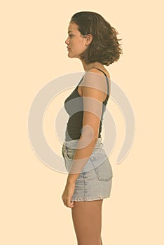 Profile view of young beautiful Caucasian teenage girl