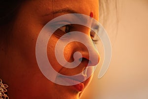 Profile of a woman with a bindi photo