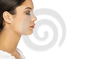 Profile of a young beautiful woman with closed eyes