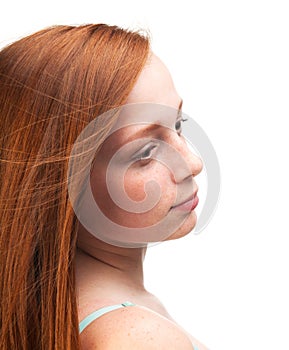 Profile of a young red-haired girl