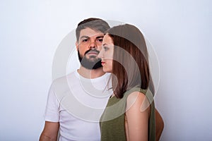 Profile of young woman on the face of young man background