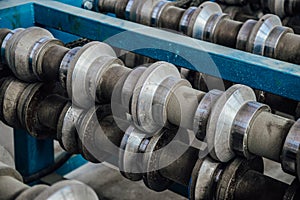 Profiling rolls of sheet forming machine close up