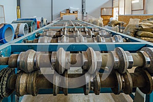 Profiling rolls of sheet forming machine close up