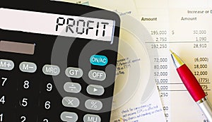Profit.Calculator with the word PROFIT. Business, finance, marketing, e-commerce concept