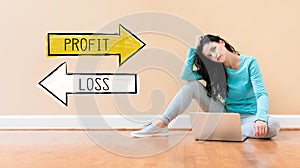 Profit or loss with woman using a laptop