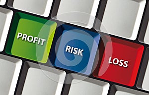 Profit risk loss word on computer keyboard finance strategy investment trading