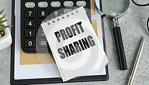 Profit Sharing text concept. Symbol Profit Sharing business financial concept