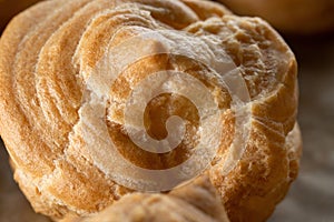 Profiterole, cake blank, macro. Beautiful golden color. photo