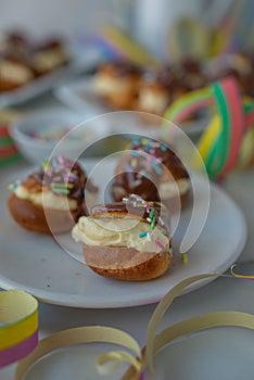 profiterole covered in chocolate sauce