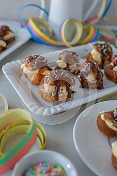 profiterole covered in chocolate sauce