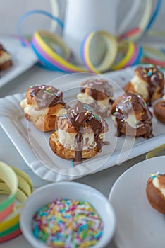 profiterole covered in chocolate sauce