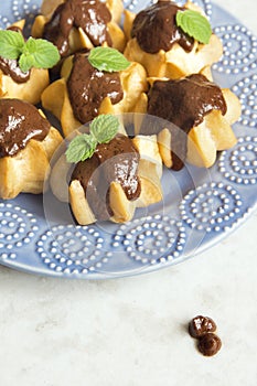 Profiteroles with chocolate sauce