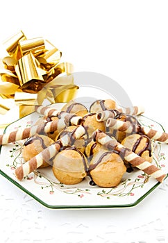 Profiteroles and golden ribbon