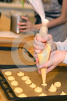 Profiteroli cooking process with dough balls