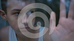 Profound Sadness: Close-Up of a Boy in Deep Depression and Sorrow