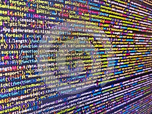 Program code with display. Application binary code. Developer working on web sites codes in office. C. Programming code screen of