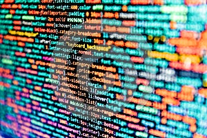 Program code PHP HTML CSS of site. Creative Js HTML5 closeup set on background. Javascript code in bracket software. Abstract
