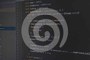The program javascript code on the computer black screen. The concept of website, internet, cyber security, hacking and software