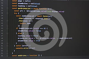 The program javascript code on the computer black screen. The concept of website, internet, cyber security, hacking and software
