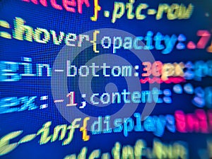 Program source code on monitor screen. Digital technology background. Abstract Green screen coding hacker concept, computer script