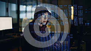 Programer checking computer code data hologram closeup. Developer working late