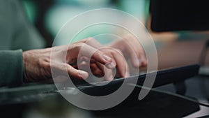 Programer hands typing keyboard working computer in data center room closeup