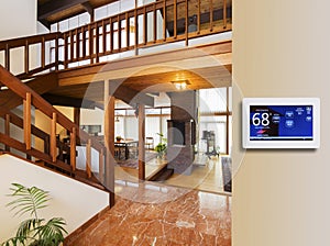 Programmable electronic thermostat photo