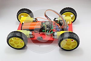 Programmable robotic car with four wheel drive and wireless control ability. Iot project concept shown on prototype model