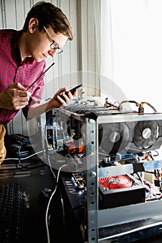 Programmer configures hardware for bitcoin mining