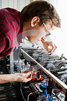 Programmer configures hardware for bitcoin mining