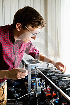 Programmer configures hardware for bitcoin mining