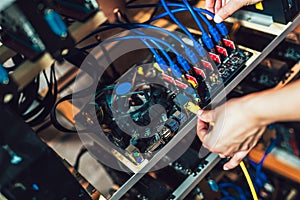 Programmer configures hardware for mining