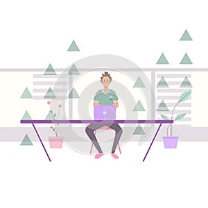 A programmer or developer sitting at a desk working on a computer or programming