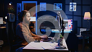 Programmer developing code on computer screen while in personal office