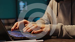 IT programmer hacking security server on computer