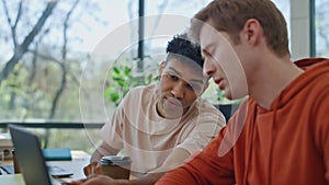 Programmer hands typing laptop keyboard coworking closeup. Man asking colleague