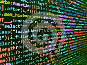 Programmer occupation. Code on dark background. Front-end applications in the color concept. Programming code abstract technology